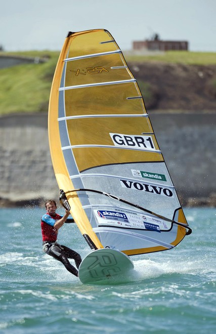 Nick Dempsey, (GBR) racing in the RSX Mens class on day 6 of the Skandia Sail for Gold Regatta, in Weymouth and Portland, the 2012 Olympic venue. &copy; onEdition http://www.onEdition.com